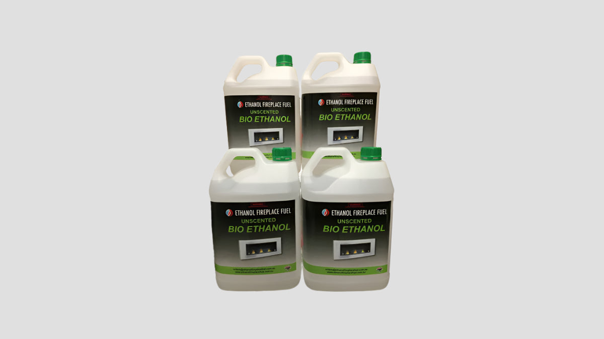 Four containers of bio ethanol on a gray background