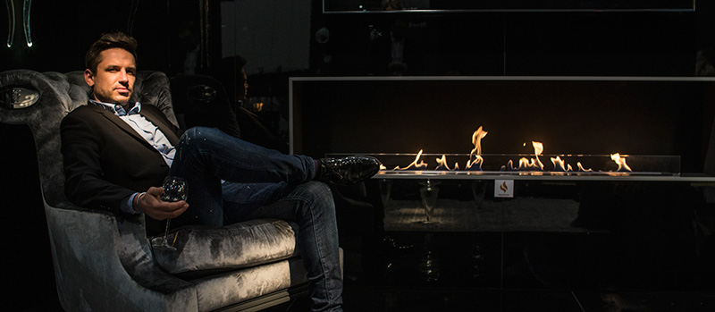 New Zealand Bioethanol Fireplace Shop - Man In Front Of Fire