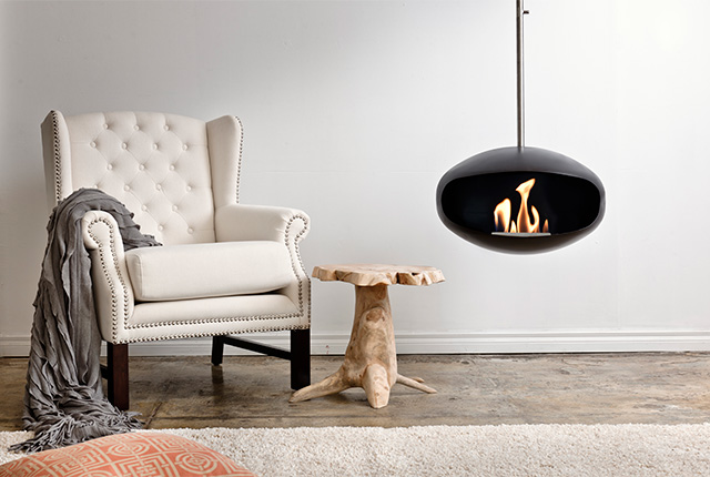 Naked Flame Biofuel Fireplaces NZ - Cocoon Fires - Modern Oval Black Hanging by Chair