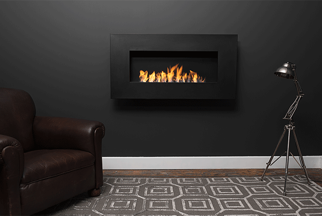 Naked Flame Biofuel Fireplaces NZ - Icon Fires - Black Wall Hung with Chair & Lamp