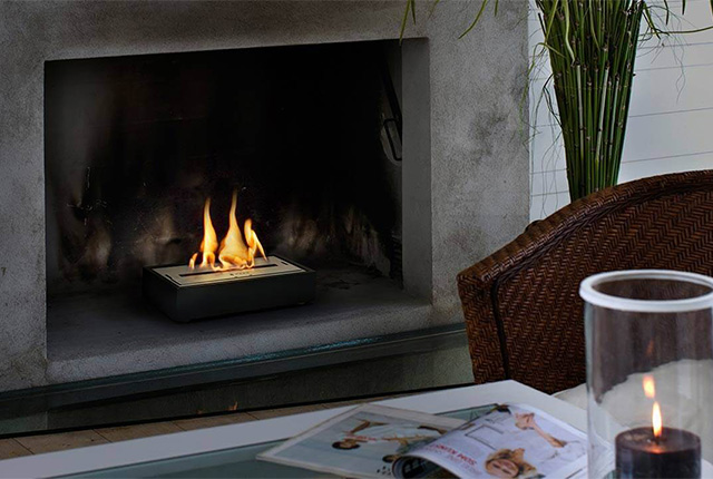Naked Flame Biofuel Fireplaces NZ - Vauni - Single Burner In Concrete Fireplace